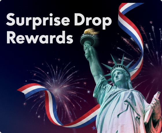 Statue of Liberty with red, white, and blue ribbon and "Surprise Drop Rewards" text, fireworks in the background.