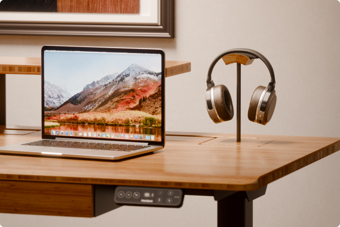 Desk setup scene, headphone stand on E7 Hive bamboo standing desk