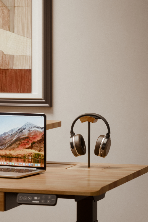 Desk setup scene, headphone stand on E7 Hive bamboo standing desk