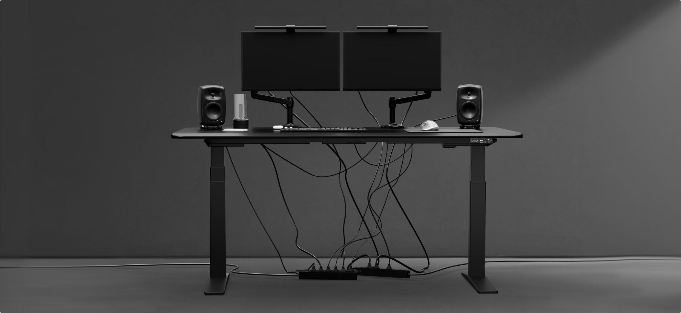 Standing desk featuring an integrated power outlet and concealed cable management for a clutter-free workspace