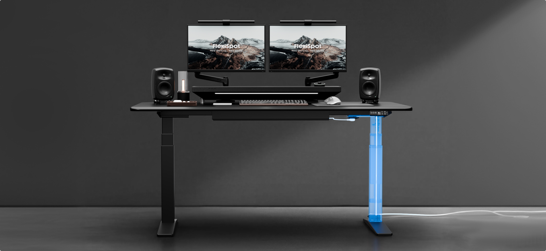 Standing desk featuring an integrated power outlet and concealed cable management for a clutter-free workspace