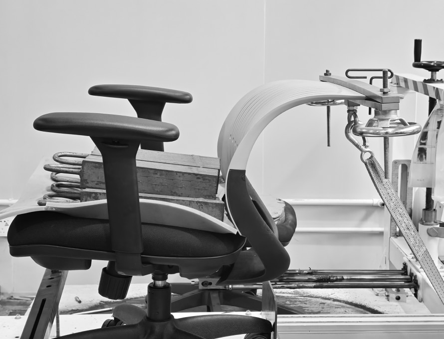ErgoStretch chair backrest durability test, meeting BIFMA and SGS standards.