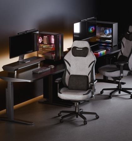 Two GC7 gaming chairs in front and side views in a dark RGB-lit gaming setup