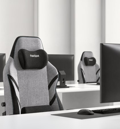 Two GC7 gaming chairs in a close-up front view at a bright workstation