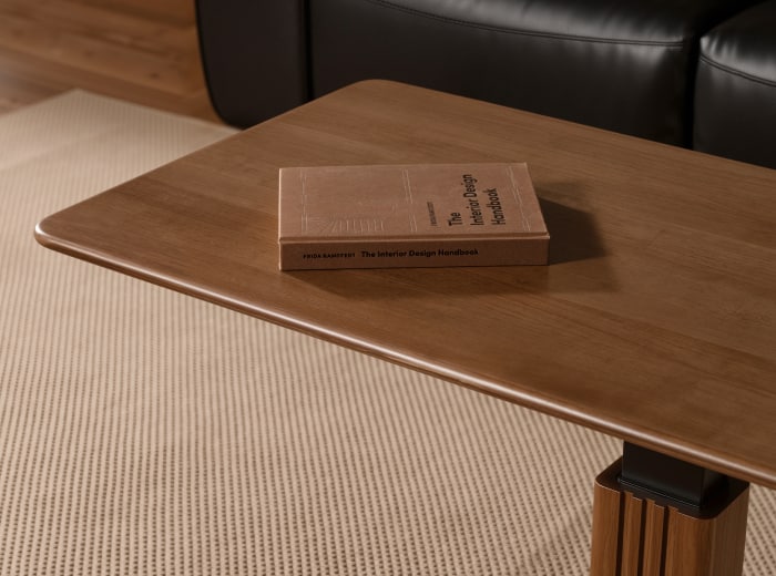 Close-up of the solid wood tabletop showing natural grain and reinforced tabletop