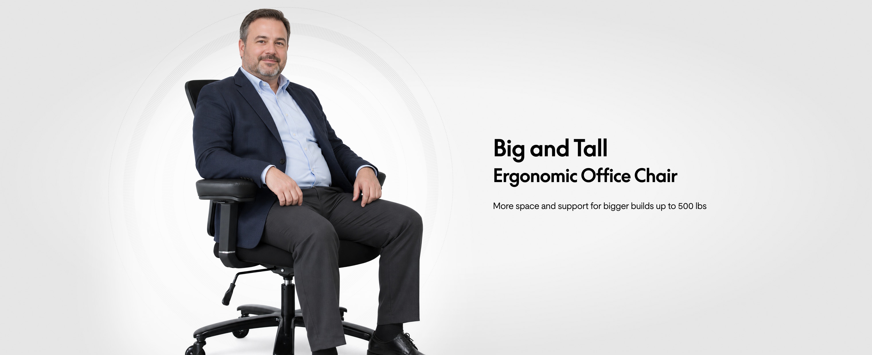 Man of larger build sits on C3 big and tall ergonomic office chair supporting up to 500 lbs