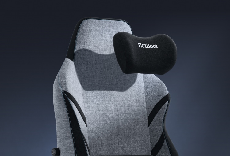 The GC7 gaming chair's magnetic headrest is shown moving into place.