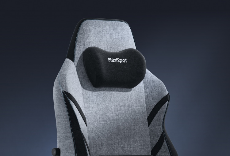 The GC7 gaming chair's magnetic headrest is shown moving into place.