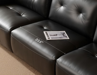 Extra-wide seating provides more room to stretch out and relax on a reclining sofa