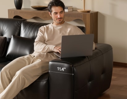 Oversized armrests provide generous support for your arms and shoulders on a reclining sofa