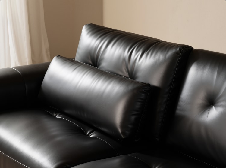 Duck feather and down lumbar pillow provides plush lower back support on a reclining sofa