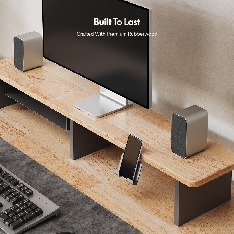 Premium rubberwood monitor stand with a natural wood finish, featuring a smartphone holder, dual speakers, and modern minimalist design.